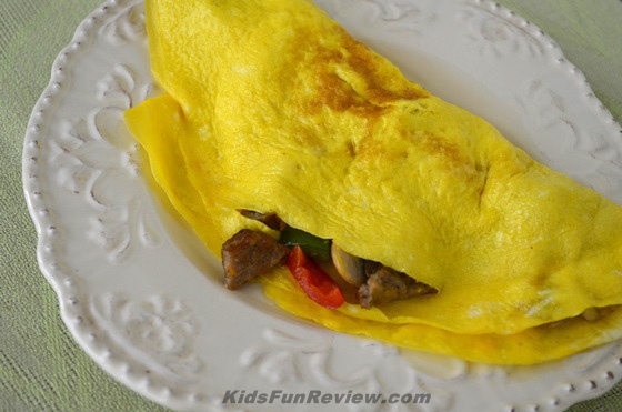 Western omelet with cheese and sausage